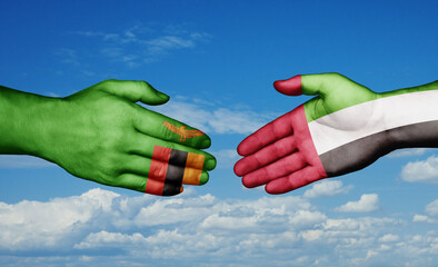 United Arab Emirates and Zambia country handshaking with flags, consensus concept international co-operation illustration