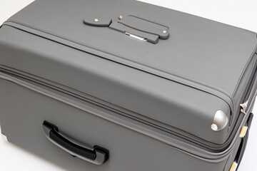 Suitcase in and gray on white during trip. trip travel concept. suitcase in white and gray on white during a trip. a concept of a suitcase and luggage in white and gray during a trip lifestyle.
