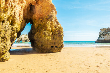 Beach and rugged coastline, photographed in Algarve region of Portugal