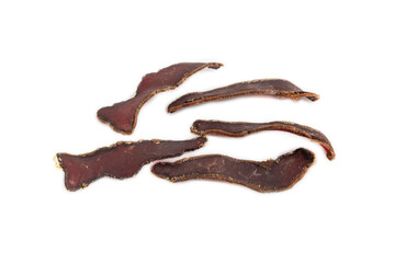 Armenian Basturma dried meat isolated on white. Side view.