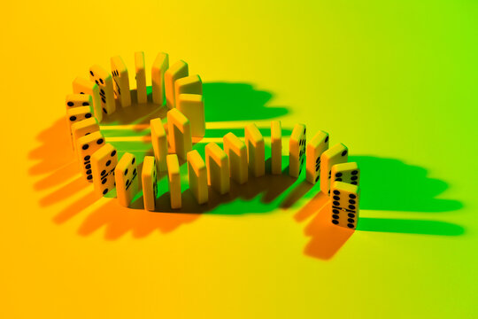 Nostalgic Dominos Cascade on Vibrant Background