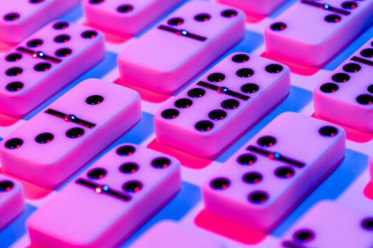 Nostalgic Pink Domino Pieces on Blue Background