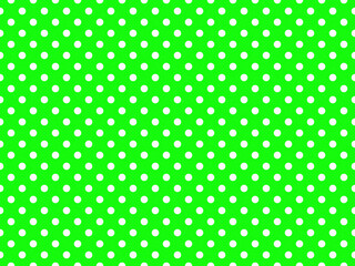 texturised white color polka dots over lime green background