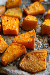 Home made, oven roasted and seasoned pumpkin. Close up shot, top view, no people