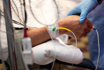 patient's hand during surgery in hospital