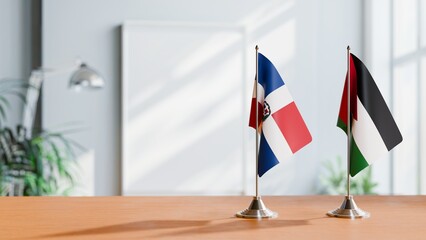 FLAGS OF DOMINICAN REPUBLIC AND JORDAN ON TABLE