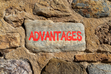 Advantages symbol. Concept word Advantages on beautiful grey volcanic stone. Beautiful red stone...
