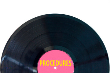 Procedures symbol. Concept word Procedures on beautiful black purple vinyl disk. Beautiful white background. Business procedures concept. Copy space.