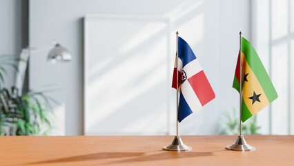 FLAGS OF DOMINICAN REPUBLIC AND SAO TOME ON TABLE