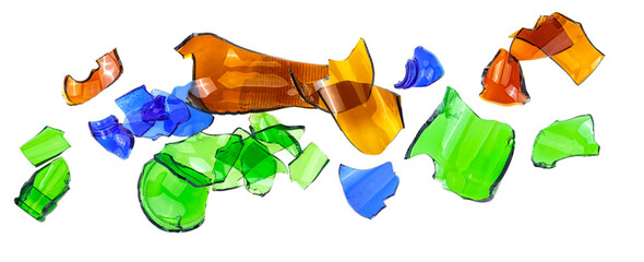 Set of broken glass - broken colored bottles on a white background, top view.