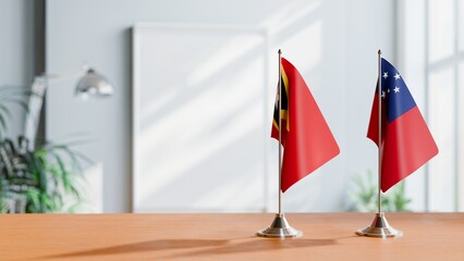 FLAGS OF EAST TIMOR AND SAMOA ON TABLE