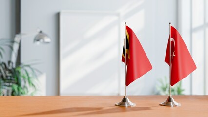 FLAGS OF EAST TIMOR AND TURKEY ON TABLE