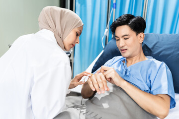 Female medicine doctor hand holding silver pen writing something on clipboard close up. Ward round, patient visit check, medical calculation and statistics concept.