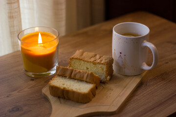 cake with lemon tea. Autumn evening.