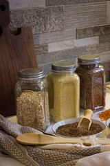 Different types of cereals, Buckwheat, Oats, flax, lentils and millet.