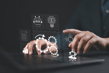 RPA, Robotic process automation concept. Businessman use laptop with virtual automation technology...