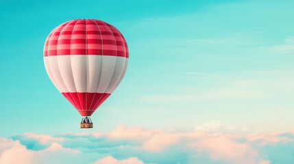 Fototapeta premium A vibrant hot air balloon glides gracefully over fluffy white clouds, offering a stunning view of the clear blue sky and a sense of adventure.