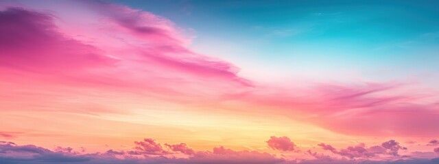 A breathtaking sunset sky featuring vibrant pink and blue hues with soft clouds, creating a serene and tranquil atmosphere perfect for nature lovers.