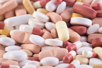 Heap of medicine pills or dietary supplements macro shot