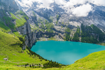 Oeschinensee Lake Panorama hiking trail during summer - Kandersteg, Switzerland © MelissaMN