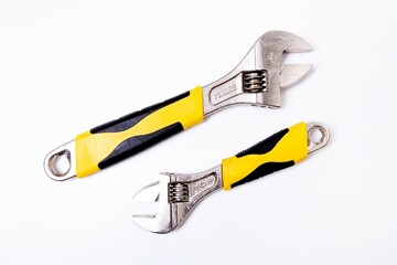 Two adjustable wrenches on a white background