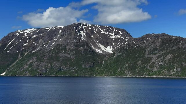 Stjern&oslash;ya, Stierdn&aacute;, Alta Municipality, Finnmark, Norway - river L&aacute;ttu mountain slope formed by glacier melted snow flows into valley as waterfall