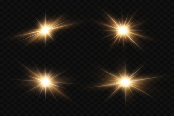 Set of bright flashes and light flare. On a transparent background.