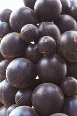 Artificial plastic berries of clusters of black grapes close -up