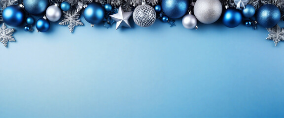 Christmas border composition on a pastel blue background with copy space
