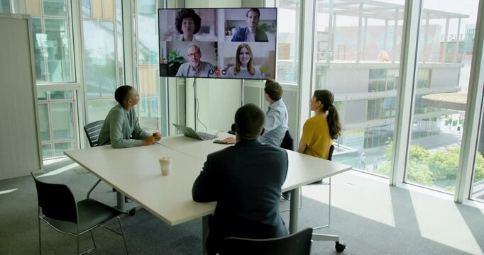 Businesspeople Having a Video conference in a Office Meeting room