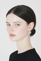 Elegant Portrait of a Woman with Flower Earrings and Glossy Lips