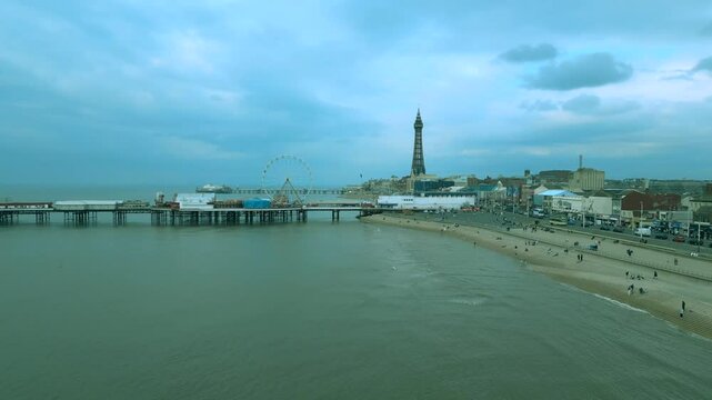 Aerial video of the beach and pier in Blackpool