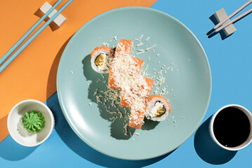 Coconut sushi rolls on a bright background