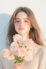 Fototapeta premium Soft Portrait of a Woman with Pink Flowers and Delicate Expression