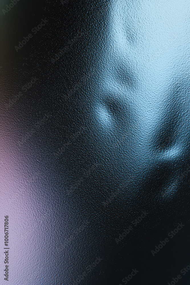 Poster abstract textured glass surface with a smooth gradient, creating a blend of colors and light reflect