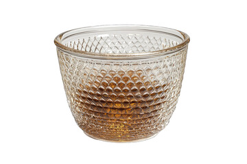 Elegant glass tumbler filled with brown whiskey, showcasing a textured design that enhances its sophisticated appearance.
