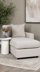 The beige chaise lounge beautifully complements the minimalist Scandinavian home, featuring rustic decor elements, a large painting, and a simple wooden floor