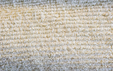 Warsaw, Poland - September 20, 2024: Close-up of a textured fabric with woven patterns, ideal for backgrounds or textile design.