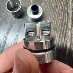 close up of hand holding a wrench