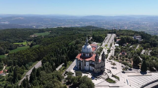 Aerial view of the Sanctuary of Sameiro in Braga, Portugal, with vast forests and valleys in the background