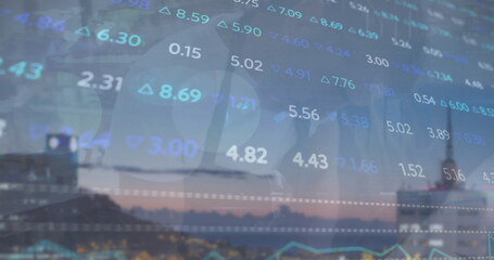 Image of financial data processing over cityscape