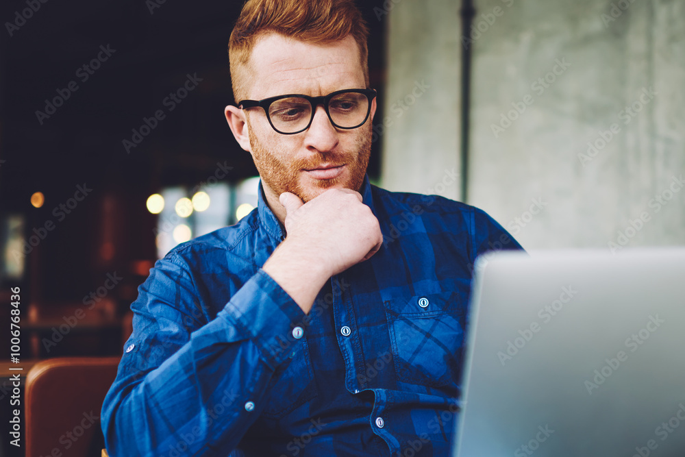 Aufkleber puzzled skilled hipster guy making payment online on online web store while connected to wifi on mod