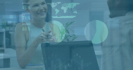 Image of financial data processing over caucasian businesswoman in office