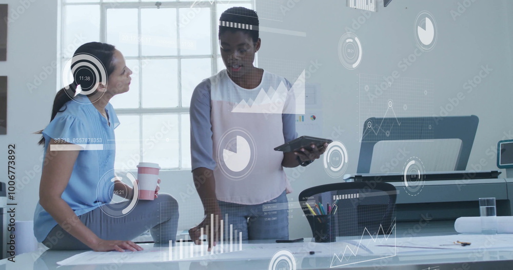 Poster image of financial data processing over diverse colleagues discussing work in office