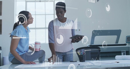 Image of financial data processing over diverse colleagues discussing work in office