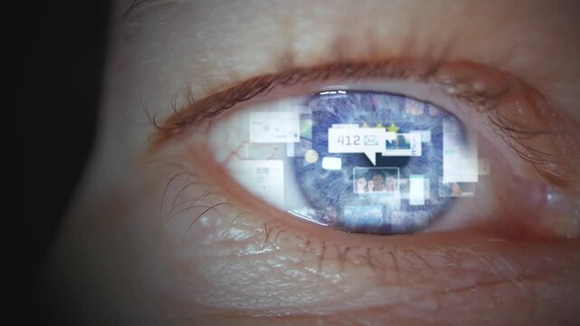Young man's eye with animation of social media icons moving fast. Addiction and health issue problem using modern technology