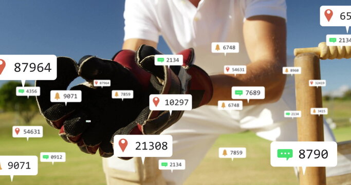 Image of icons and data processing over caucasian male cricket player