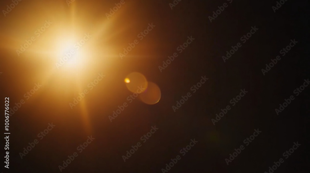 Poster a vibrant yellow lens flare emits intense brightness, with rays extending outward against a dark bac
