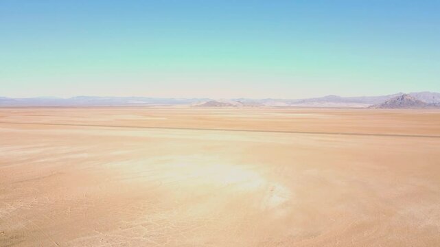 Drone over Nevada dry lake bed on sunny day