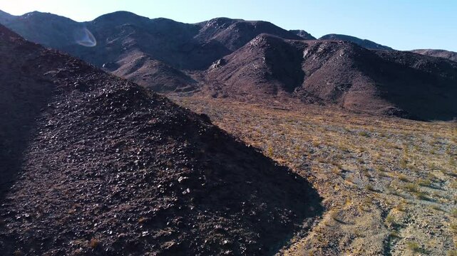 Drone by Nevada desert hills